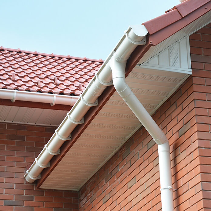 Close up view on House Problem Areas for Rain Gutter Waterproofing Outdoor. Home Guttering, Gutters, Plastic Guttering System, Guttering &amp; Drainage Pipe Exterior